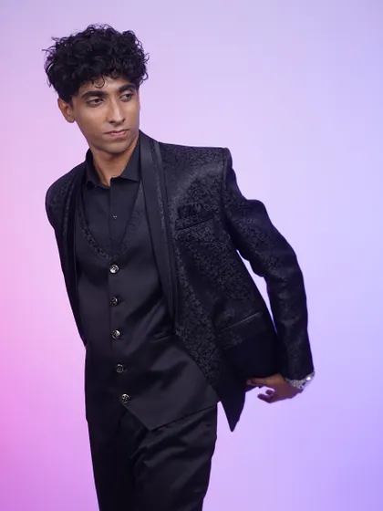 Another shot of the black tuxedo, showing how it looks from the side. The fit is everything.