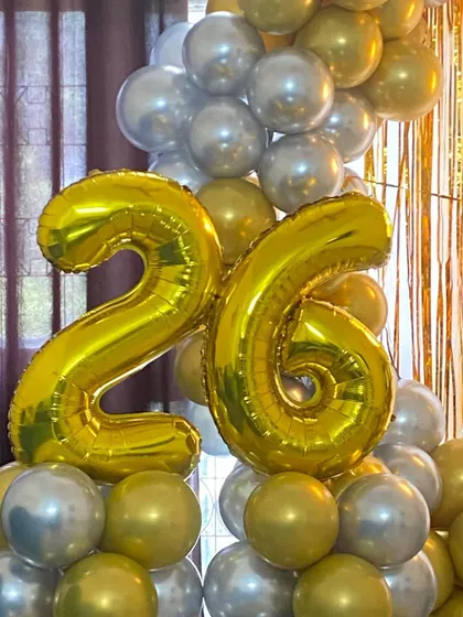 Another shot of the bold, metallic number balloons for the 26th birthday party.