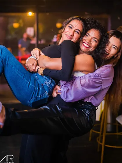 Friends having fun and being playful for the camera.