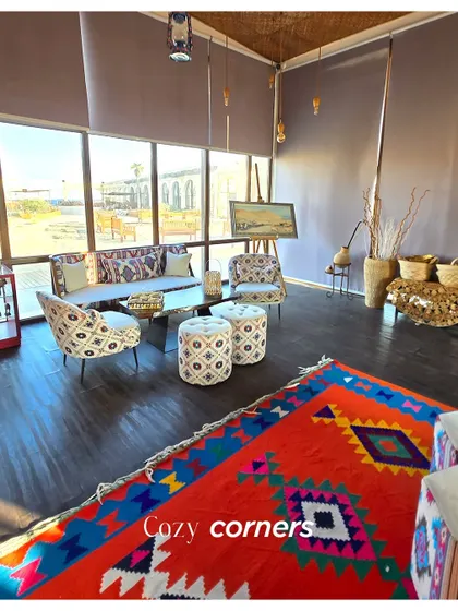 Cozy corners and vibrant decor at a luxury resort in Doha. This image shows how thoughtful interior design can create a warm and inviting atmosphere for guests.