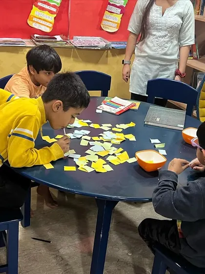 A word game in action. These activities are great for building vocabulary and teamwork skills during our camps.