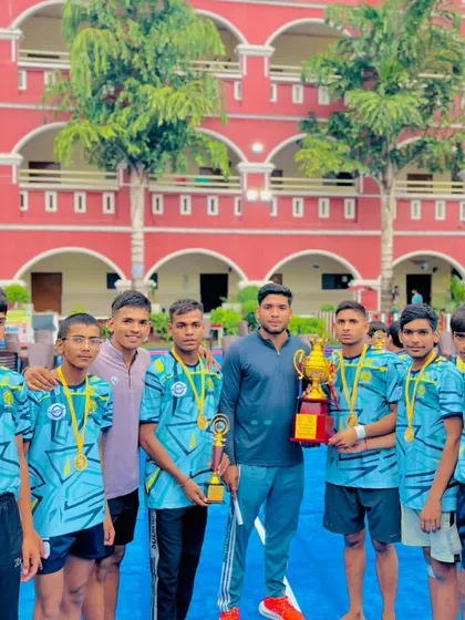 Posing with the winning trophy after a successful CBSE cluster tournament. These victories are the result of countless hours of practice.