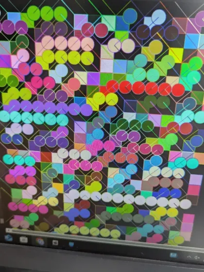 The vibrant results of our mini-hackathon where students had just 40 minutes to create generative art. This piece uses a mix of circles and squares to create a colorful, dynamic pattern.