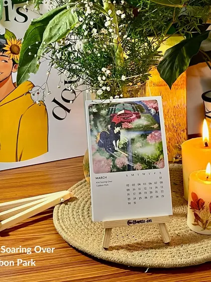 The March page, 'Kiki Soaring Over Cubbon Park', on its easel. This setup shows how the calendar can be a lovely piece of home decor.