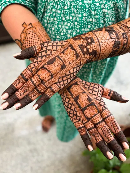 The back of the hands for a baby shower, featuring adorable elephant family motifs, symbolizing the growing family.
