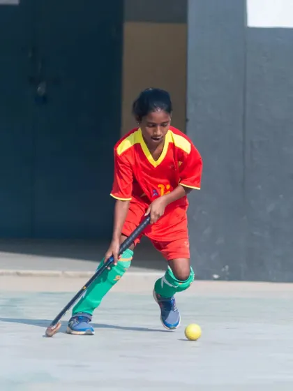 A player from our 'Giving is FunDa' 2023 camp held at St. Germain Academy, focused on controlling the ball.