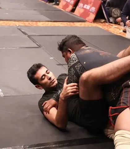 A moment of intense focus during a BJJ match at ADCC India. This is where technique and heart collide, and our fighters are trained to excel in these high-pressure situations.