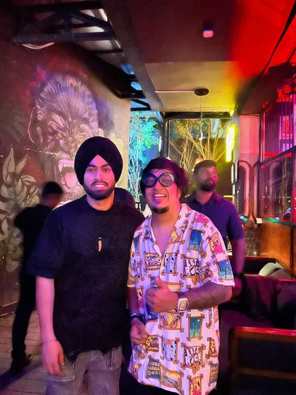 A photo from the Juss concert, with the venue's cool graffiti art in the background. These events bring a unique and powerful energy.