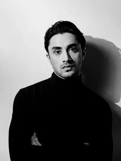 A classic, confident portrait of Lakshya Parikh from the same series.