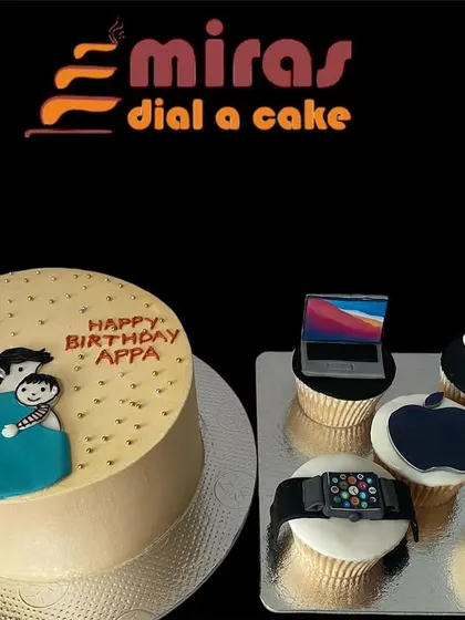A thoughtful gift for a tech-savvy dad. This set includes a main cake showing a father and son, plus matching cupcakes decorated with edible Apple products like a MacBook, iPhone, and Apple Watch.