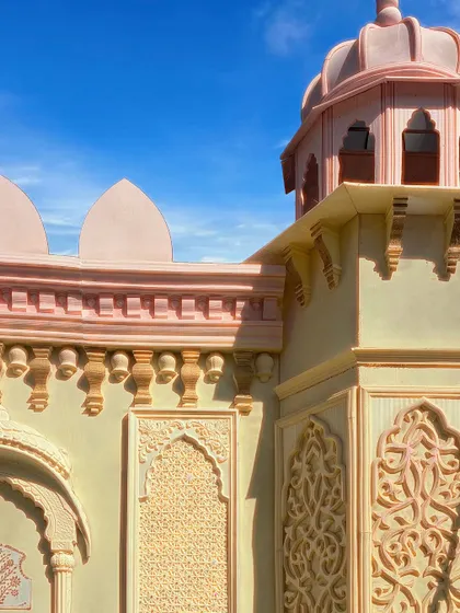 A close-up of the detailed architectural work on one of my palace sets. Every element, from the carved jharokhas to the delicate patterns and domed roofs, is carefully crafted to achieve an authentic and luxurious finish.