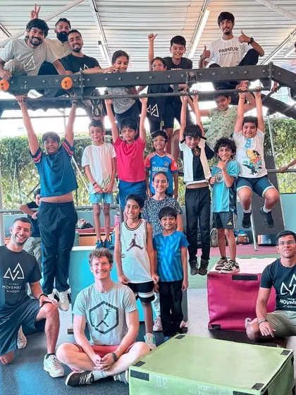 Our kids get to learn from the best too. A group photo of our young students with international coaches Chris and Flavio after an inspiring workshop.