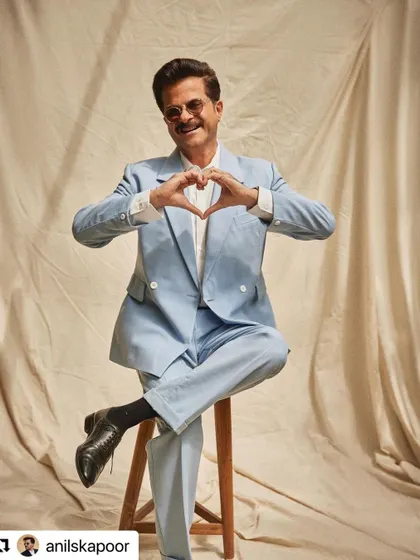 A more playful shot of Anil Kapoor in a powder blue suit. The hair remains dapper and perfectly in place.