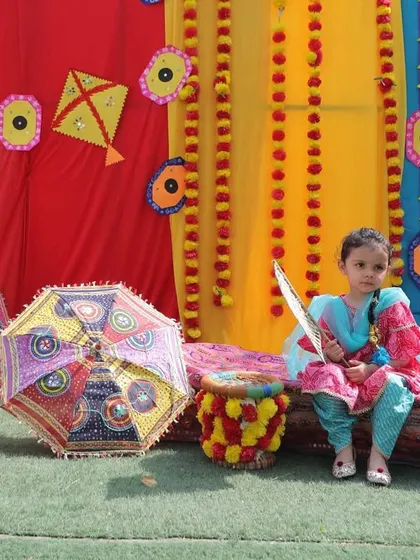 Our Baisakhi setup was a riot of colors, complete with phulkari umbrellas and kites, creating a perfect backdrop for the children to experience the festive Punjabi culture.