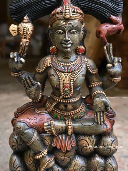 A close-up of the face and torso of the 25.5-inch Mahadev statue, highlighting the hand-painted details.