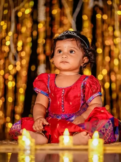 This Diwali, our little star is lighting up our world. We create magical, festive scenes for special occasions.