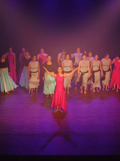 The final pose from a performance, showcasing the unity and artistry of our students.