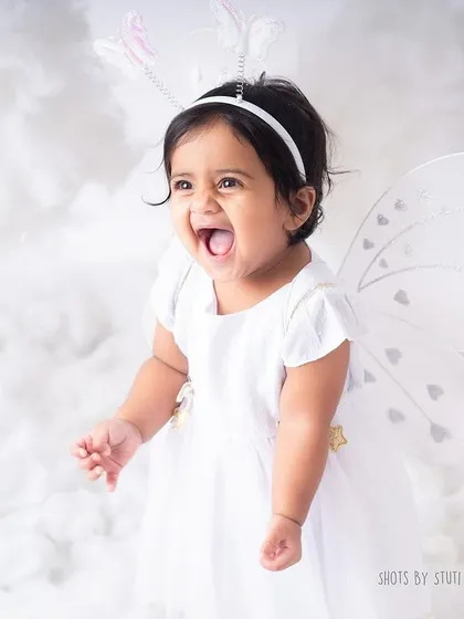 A burst of pure, unfiltered joy. This is the kind of reaction I aim for in every session, a moment of happiness frozen in time.