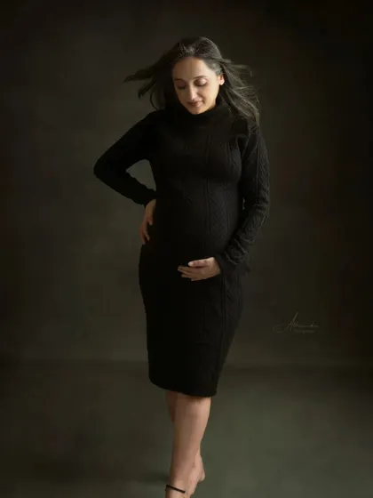 A beautiful solo shot with a sense of movement. The soft fabric of the dress and the gentle sway of her hair create a dynamic and graceful portrait.