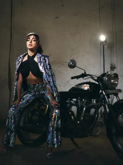 This series of shots captures the full biker-chic look I created for Divya Khosla Kumar's 'Yaariyan 2' promotions. The sequined jacket and pants by Any Old Iron paired with a simple black top created a cool, modern promotional style.
