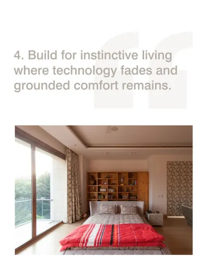 We build for instinctive living, where technology fades and grounded comfort remains. This bedroom, with its simple furnishings and large window connecting it to the outdoors, is a perfect example of this principle.