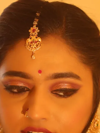 Another angle of the eye makeup, showing the shimmer on the lid. I use high-quality pigments to ensure the eyeshadow is vibrant and stays put without creasing.