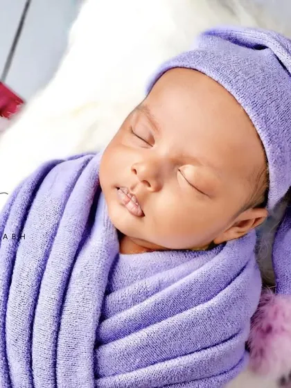 A peaceful sleeping portrait from the side.