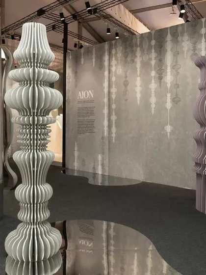 A repeat of image 105, showing the sculptural totems of the 'Silver Escapade' installation.