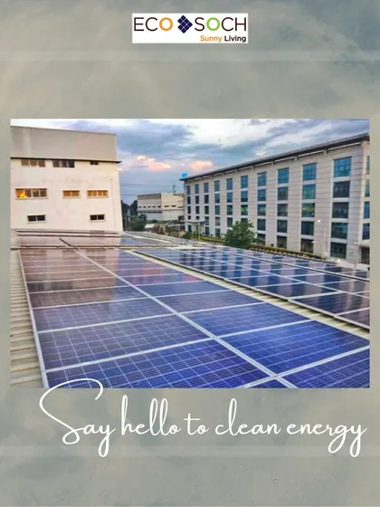 A clean array of solar panels installed on an industrial building. This image represents our commitment to helping businesses say hello to clean energy, reducing their operational expenses and environmental impact simultaneously.
