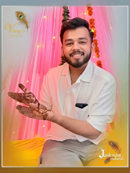 The groom showing the side view of his intricate couple portrait henna.
