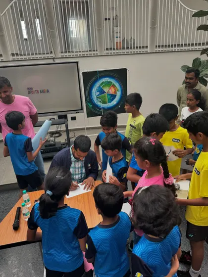 The future of badminton eagerly getting autographs from a legend. These moments of inspiration are what we cherish at Badminton Gurukul.