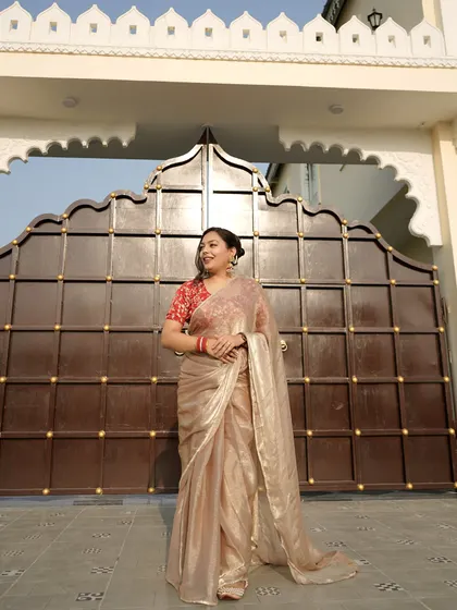 A full-length shot showcasing the entire look. The statement earrings provide the perfect amount of adornment for an elegant and balanced appearance.