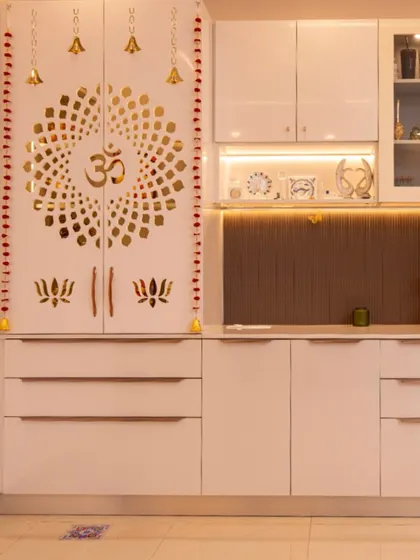 Another angle of the combined pooja and crockery unit, highlighting its sleek, modern design and glossy white finish.