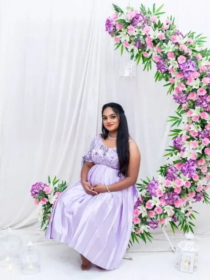 This lavender dress looks beautiful with our floral moon-gate prop, creating a dreamy and magical atmosphere.