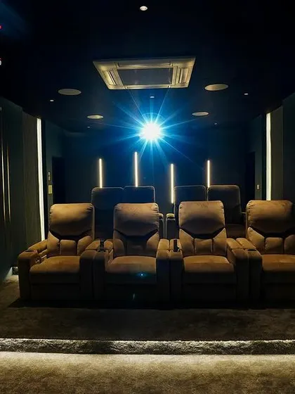 A duplicate of 195, this image captures the classic "lights down, projector on" moment that signals the start of a true cinematic experience at home.
