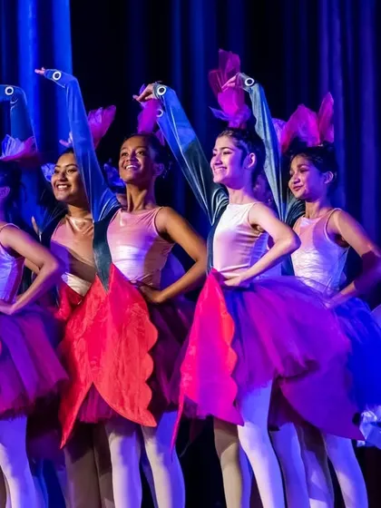 The Dodo birds and their flock perform in "Alice." Our productions often feature whimsical characters and creative costumes, bringing a sense of playfulness and imagination to the stage.