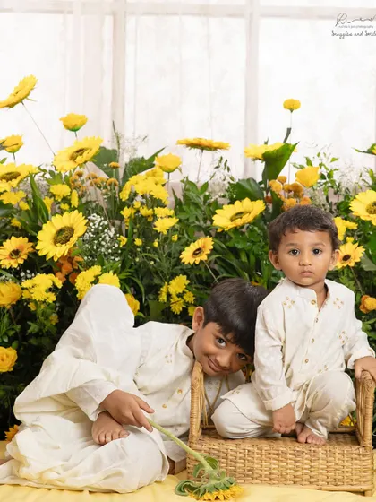 A playful moment between brothers during our Rakhi mini-session. The field of sunflowers creates such a happy and warm backdrop.