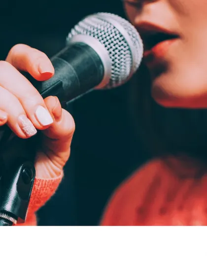 Proper microphone technique is a key part of modern vocal performance. Our lessons cover everything from fundamental breathing exercises to the practical skills needed for live and studio singing.