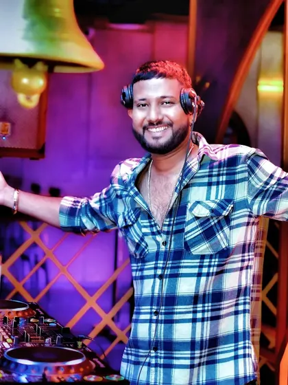 A happy moment behind the decks. Ask yourself what you want to do every day, and then do it.
