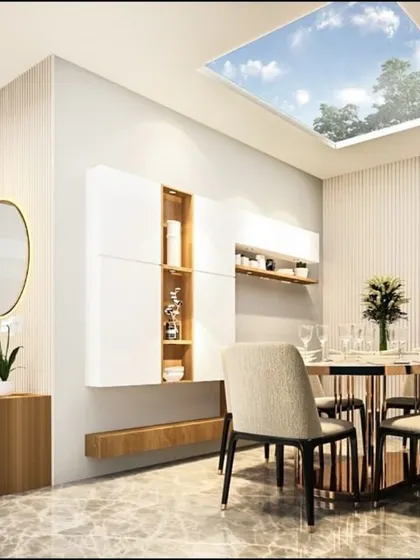 This dining area in our Pune villa project is situated directly under a large artificial skylight, flooding the space with natural light and creating a bright, airy atmosphere for meals.