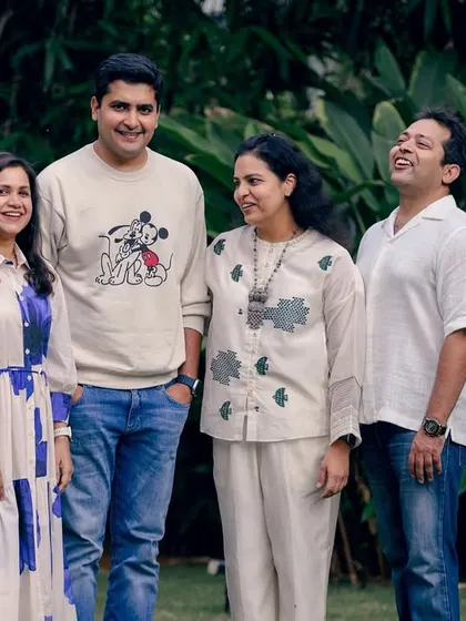 A group portrait of friends or extended family sharing a laugh. My sessions can accommodate larger groups to capture these wonderful shared memories.