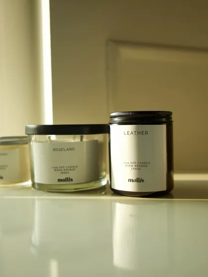 A lineup of my different candle sizes, showing the 100g, 200g, and 250g jars.