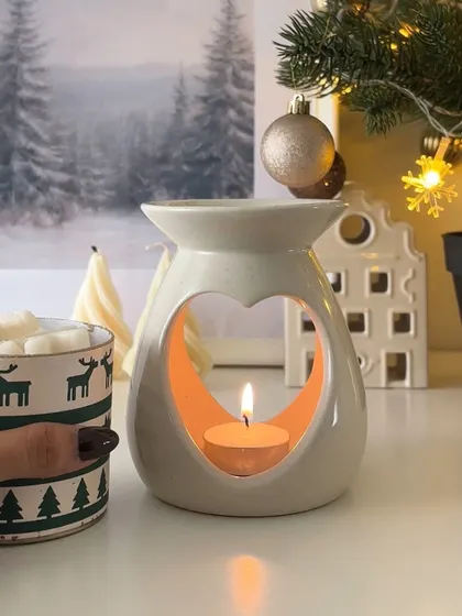A cozy Christmas scene, but our heart diffuser is perfect all year round for creating a warm, loving atmosphere.