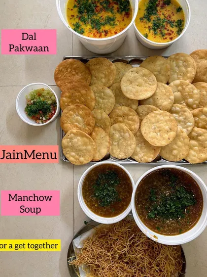 A unique combination for a get-together: traditional Jain Dal Pakwaan served alongside modern Jain Manchow Soup with fried noodles.