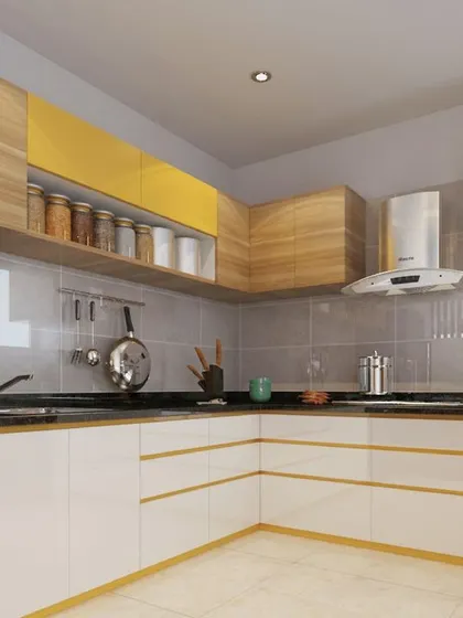 The kitchen from our 'Modern Fusion' project in Pune. It combines white and yellow cabinets with wood textures, creating a bright, cheerful, and contemporary space.