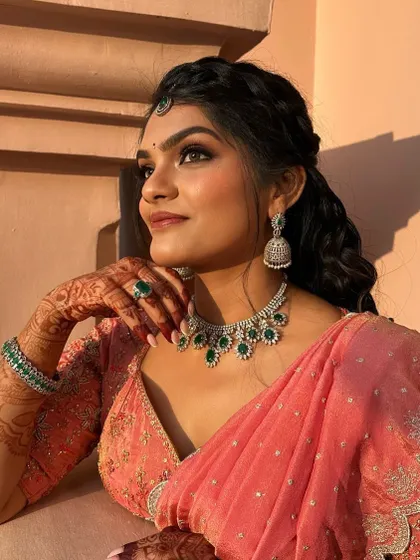 The golden hour glow perfectly complements the warm tones of this upcycled Kanchi saree lehenga. A truly magical look.