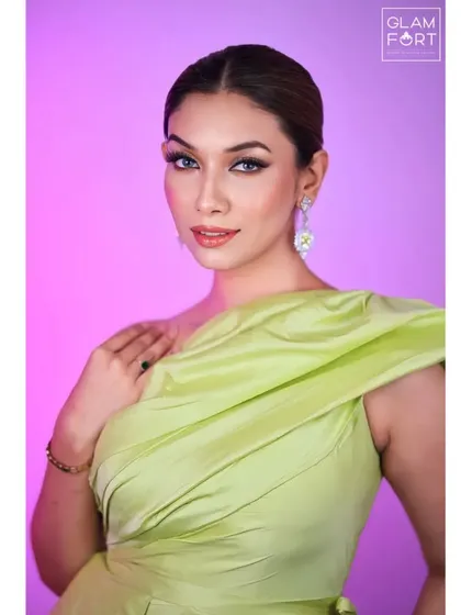 A close up portrait showing the flawless skin finish and the soft, blended eye makeup. This is a perfect look for an engagement or a cocktail event.