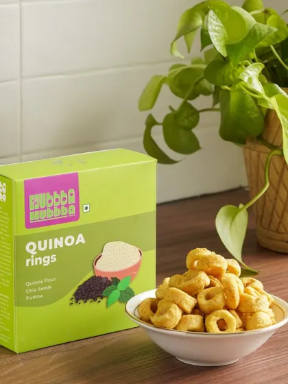A clean, kitchen-counter shot of quinoa rings, using natural light to create a fresh and healthy feel.