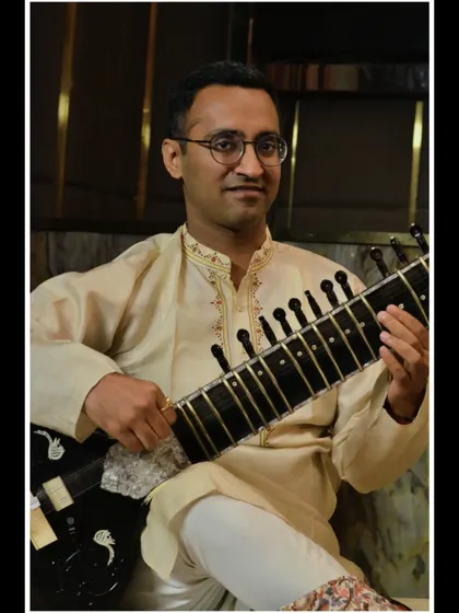 A classic portrait, looking towards the audience.