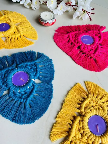 A vibrant collection of my macrame tealight holders. These are a great way to add a pop of color and handmade charm to your Diwali decorations.